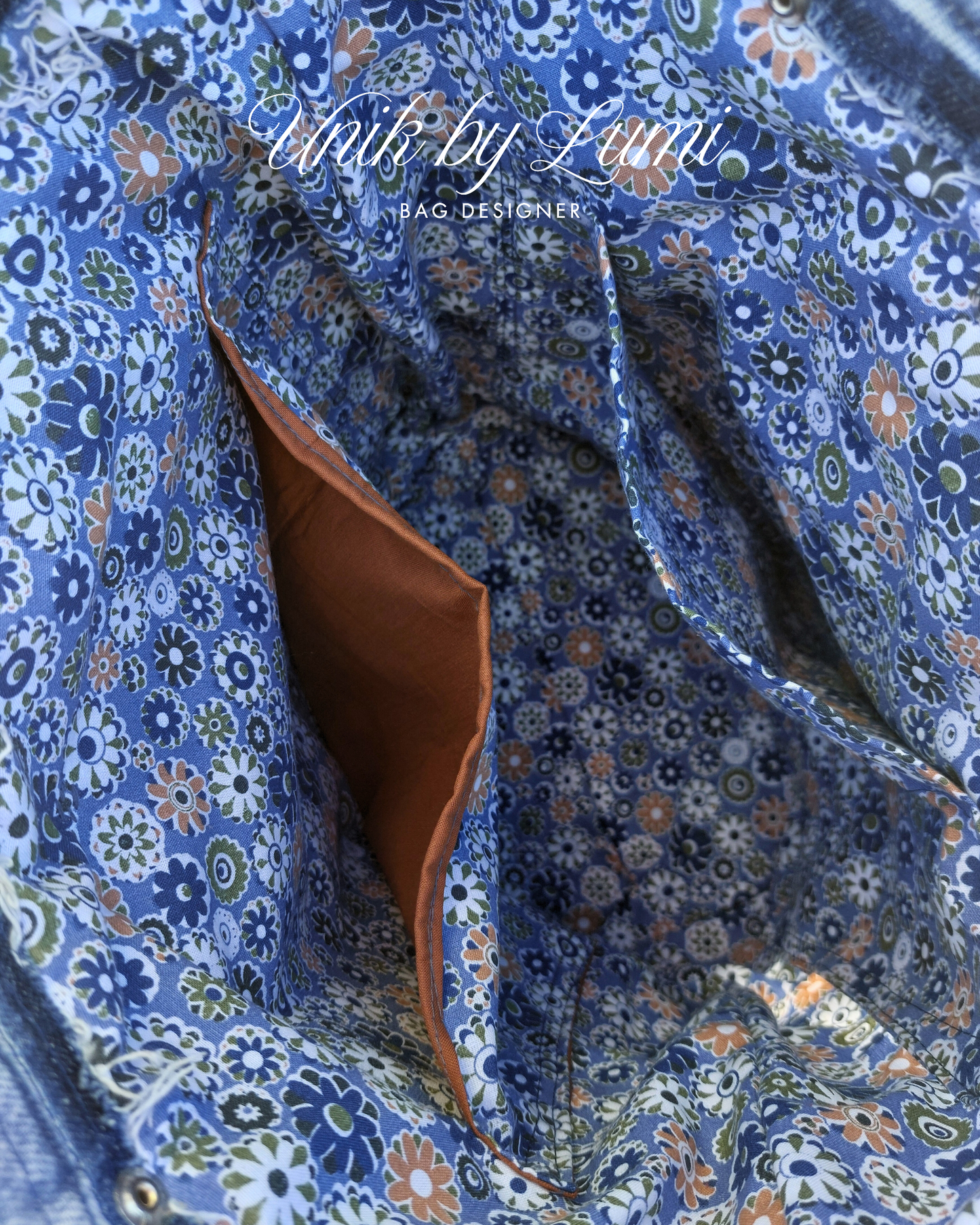 Unique handmade bag with blue floral lining and multiple pockets