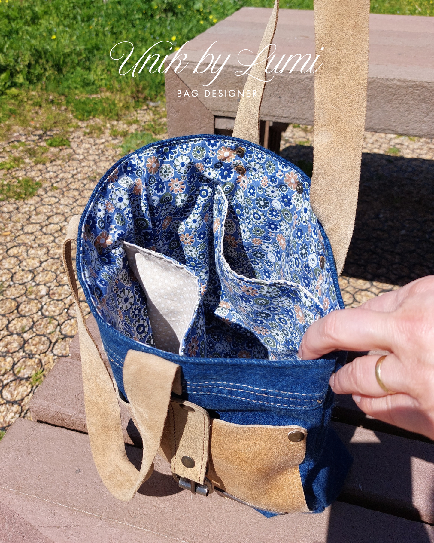 Blue denim bag with floral pattern
