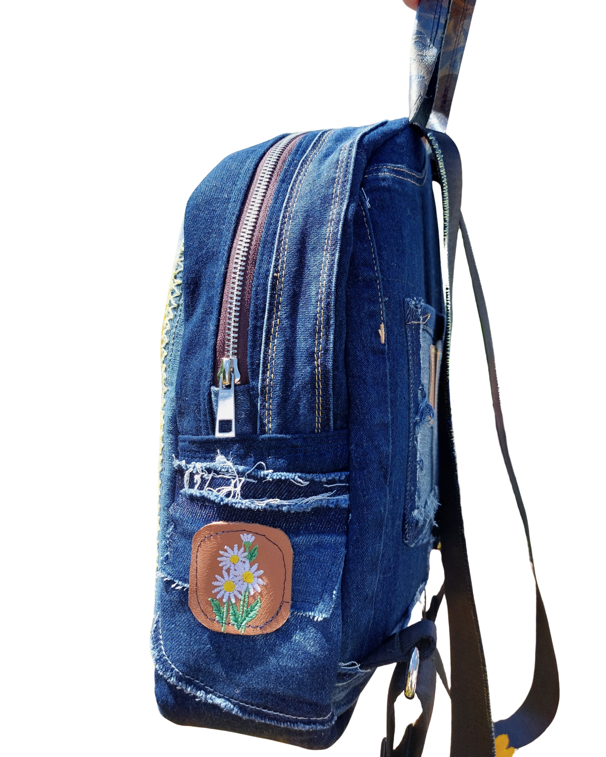 Blue denim backpack with floral patch 